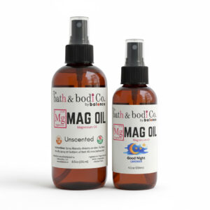 Two Balence Magnesium Oil Spray bottles—9.5 oz Unscented and 4.5 oz Good Night Lavender—arranged closely side by side on a clean white background with sharp, authentic labels and soft natural reflections.