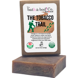 Handmade brown artisan soap bar labeled “The Tobacco Trail” by Bath & Bodi Co. by Balence, featuring a warm woodsy tobacco scent profile with amber and spice notes.