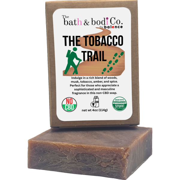 Handmade brown artisan soap bar labeled “The Tobacco Trail” by Bath & Bodi Co. by Balence, featuring a warm woodsy tobacco scent profile with amber and spice notes.