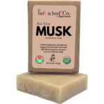 Not Elon MUSK African Musk goat milk bar soap by The bath & bodi Co. with boxed soap and bar displayed